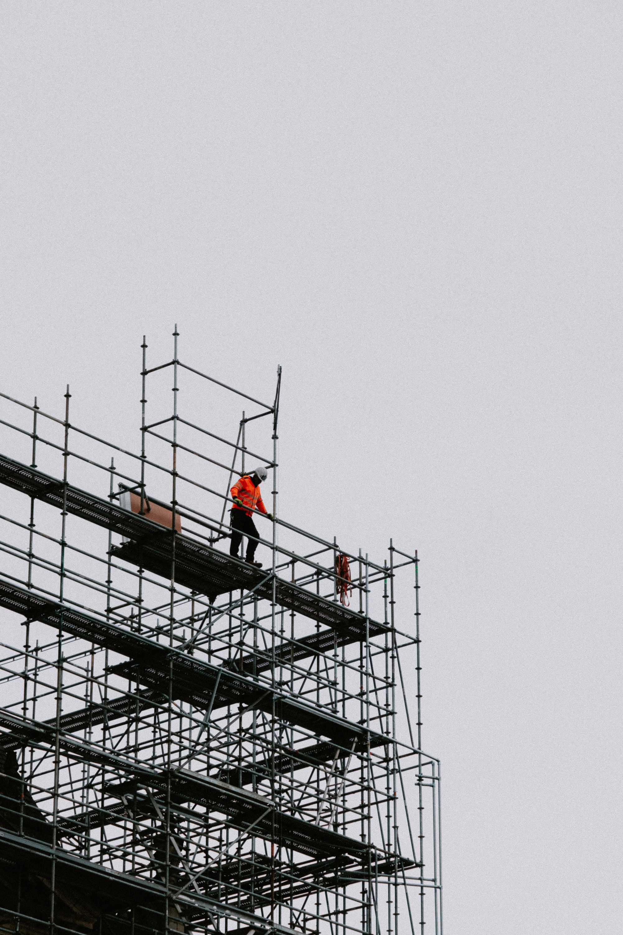 Photo of a Construction Worker on Building Under Construction